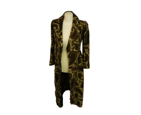A 1970s wool-work/tapestry winter coat: the maxi coat is in a foliage and scroll pattern on a beige background with revered c