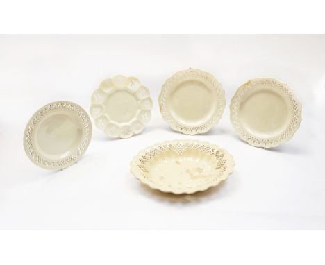A small group of 18th century creamware, to include three plates with pierced borders, a lobed pierced plate and an oval pier