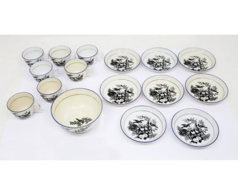 A collection of 19th century pearlware cups and saucers and a slop bowl, black printed with birds in branches , seven cups, e