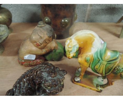 A selection of oriental treen and ceramic figures