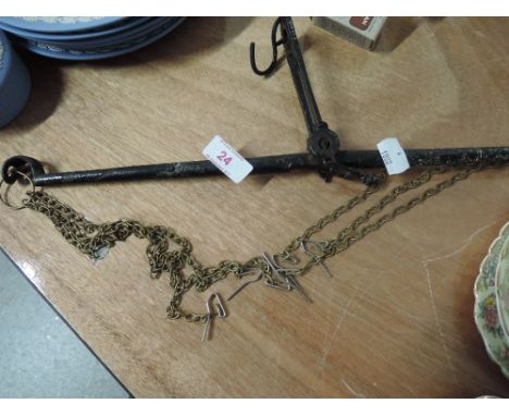 An antique balance scale arm 