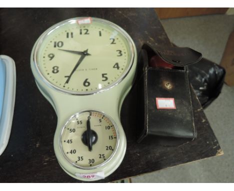 A vintage clock and timer, and motorists fire extinguisher  