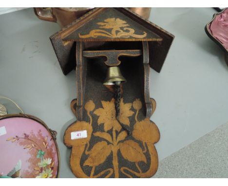 A vintage hall way bell in a art nouveau style 