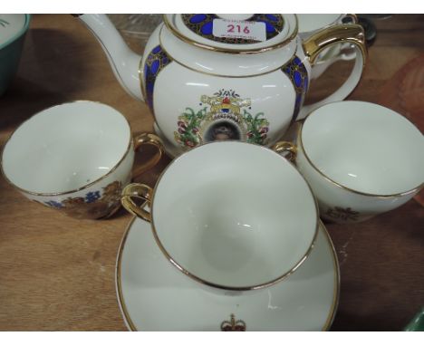 A selection of vintage ceramic coronation ware including tea pot cups and saucers etc