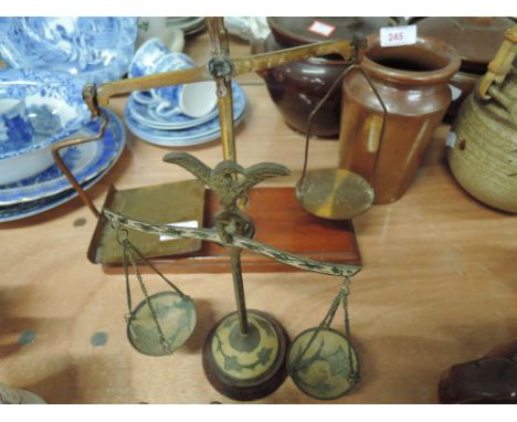 A set of balance scales marked DE Grave Short & co G P O post office