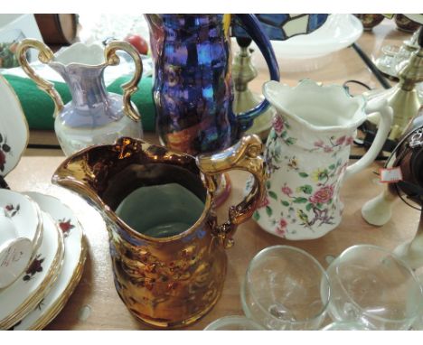 A selection of vintage ceramic milk or other jugs