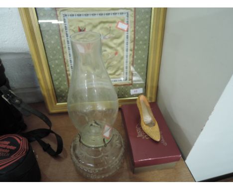 A silk embroidery framed, collectable shoe ornament and vintage oil lamp