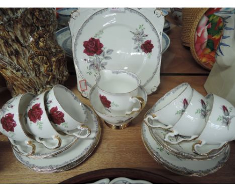 A part tea service by royal stafford Roses to remember pattern