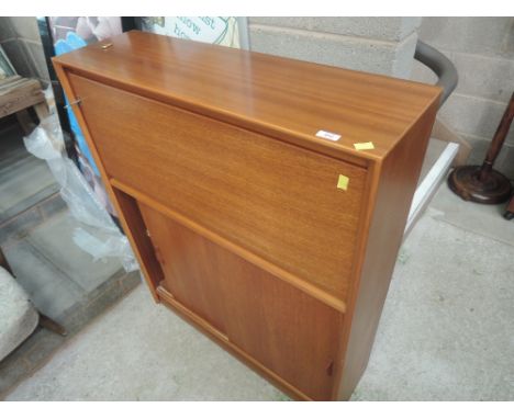 A vintage teak bureau, labelled Gibbs 
