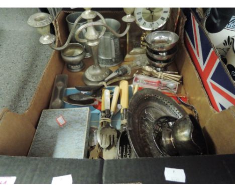 A miscellaneous box including carriage clock, flatware, candelabrum