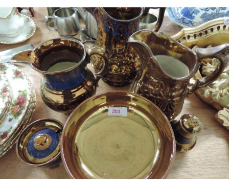 A selection of vintage ceramic lustre ware jugs plates etc