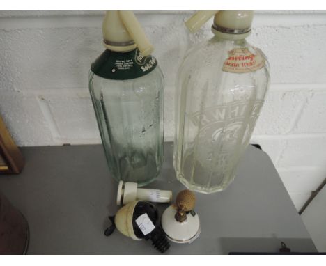 Two vintage cocktail makers soda syphons one with etched glass logo R.Whites