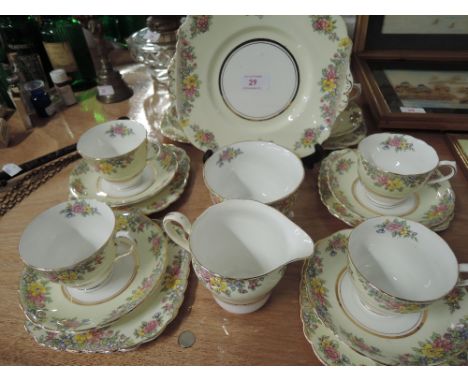 A part tea service by Colclough China in cream with flower transfer