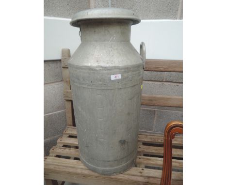 A vintage aluminium milk churn
