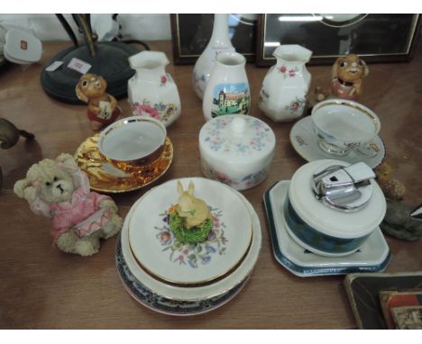 A selection of ceramic trinkets, table lighter etc