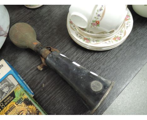 A vintage Miller car horn