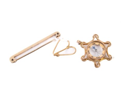 Three gold and yellow metal items. Including a Victorian compass in a six-pointed frame, hallmarked Birmingham 1968, a 9ct go
