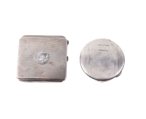 Two silver vintage powder compact. One with hallmarks for Birmingham 1948, the other Birmingham 1939, with an 'Observer Corps