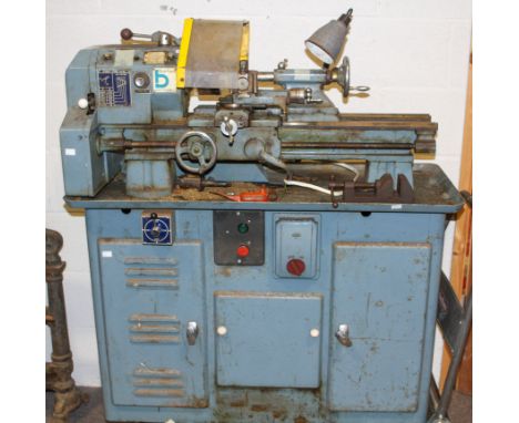 Boxford model 'C' engineering metal working lathe. Comes with various chucks, tooling and a work light. H123cm x W110cm x D45