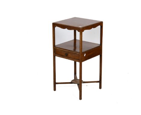 An Edwardian mahogany washstand. With two shelves and a drawer, supports united by cross stretcher with central circular shel