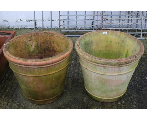 A pair of large ceramic garden pots. H53cm Max. diameter 59cm