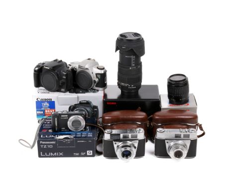 A collection of cameras and lenses. To include a Canon EOS 350D, powers on, shutter working, with makers box, a Canon EOS 500