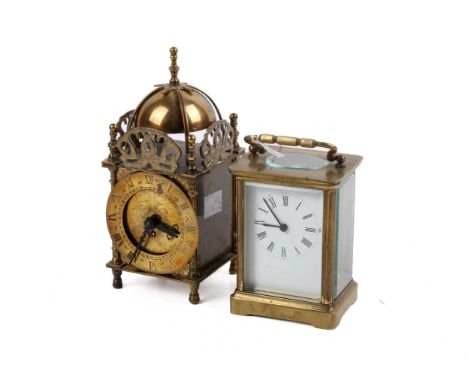 Two 20th century mantel timepieces. Including a French carriage clock and a lantern style clock. Max. H17cm