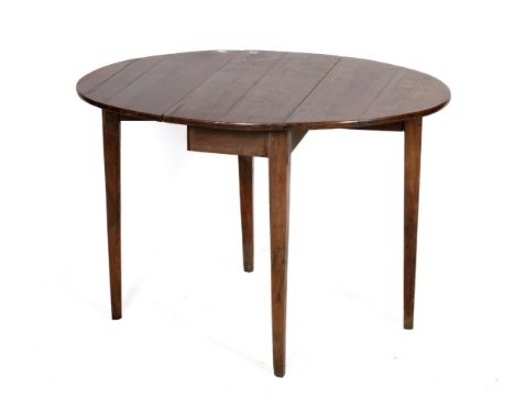A mahogany oval top gate leg table. Having square tapering supports. H71cm x W101cm x D75cm