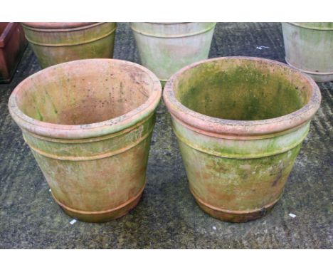 A pair of large ceramic garden pots. H53cm Max. diameter 59cm