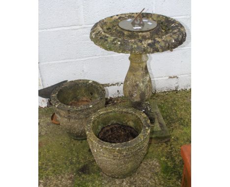 A pair of reconstituted stone garden pots and a similar sundial. Max. H77cm