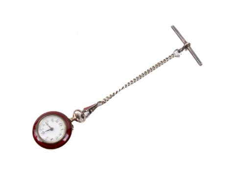 A silver and enamel cased fob watch. The white enamel dial with Arabic numerals, the engine turned enamel case with gilt deco