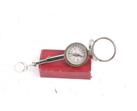 A combination field compass. With dual lens, telescope, mirror and a magnifying glass, L7cm