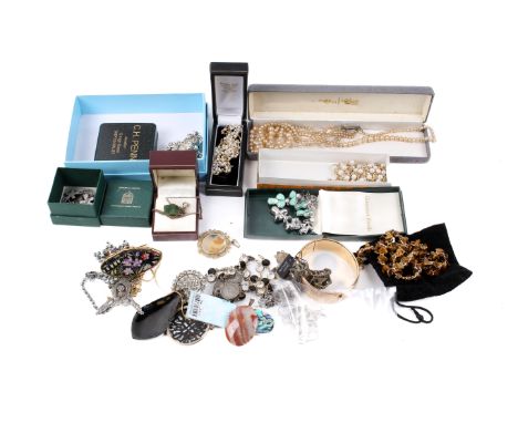 A small collection of costume jewellery. Including a rolled gold bangle, Swarovski bird pendant, faux pearl necklaces, Belgia