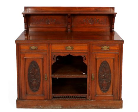 An Edwardian mahogany chiffonier sideboard. Having carved panelled doors with three drawers above. H124cm x W134cm x D47cm