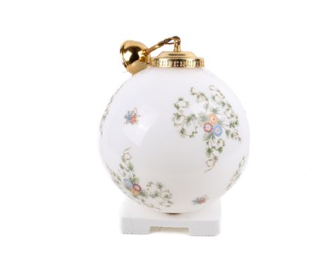 A white glass globe pendant ceiling light. Having printed floral decoration, brass fittings. Diameter 30cm