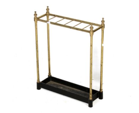 An Edwardian brass stick umbrella stand. Having a cast metal base. H58cm x W46cm x D15cm