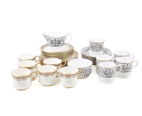 Two sets of coffee cups. Including five Royal Worcester Padua cans and saucers, jug and sugar bowl with five Cauldon Ltd trio