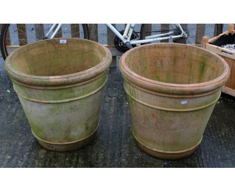 A pair of large ceramic garden pots. H53cm Max. diameter 59cm