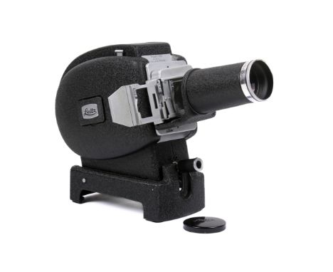 A Leitz Prado 250 35mm slide projector. Black. Serial number 86614. With a Leitz-Hektor 10cm f2.5 lens, lens cap, film carrie
