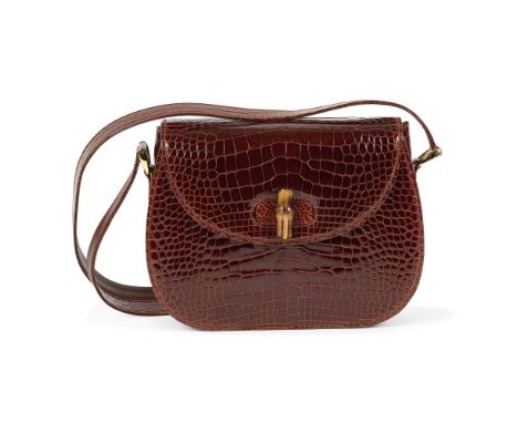 GUCCI. Sac Bamboo d'épaule en crocodile cognac.Année 2016.Fermoir pivotant sur rabat, anse bandoulière réglable, poche extéri