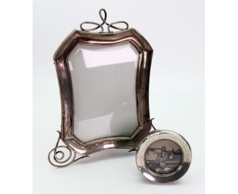 A late Victorian silver mounted easel photograph fame, Birmingham 1898, maker marks H & A, of shaped outline with wire work s