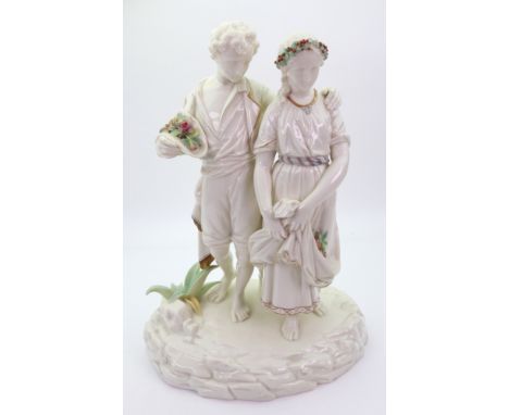 A Royal Worcester glazed Parian group of Paul and Virginia, circa 1865, mostly left in the white, modelled standing before a 