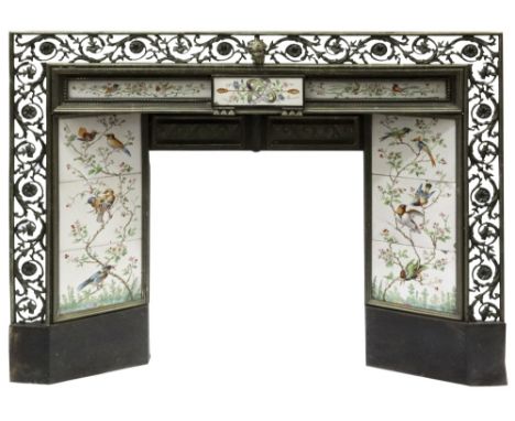 A brass fire surround, circa 1880, with an outer border pierced and cast with flowering branches, the narrow frieze and angle