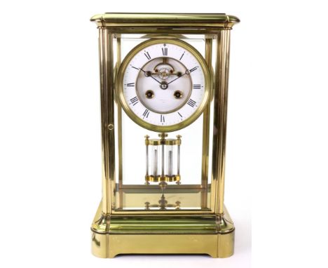 Leroy & Fils Paris; a late 19th century brass and four glass mantel clock, with bevel edge panels, the two part white enamel 