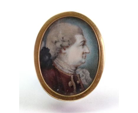 English School, 18th Century, A portrait miniature of a gentleman in profile, wearing a maroon coat with gold buttons, 2.5cm 