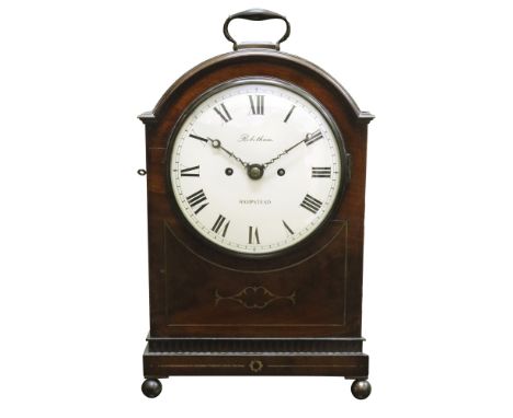 Robatham Hampstead; a Regency mahogany brass strung bracket clock, the moulded arched top with brass carrying handle, the re-