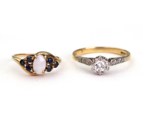 A single-stone diamond ring, the brilliant-cut stone approx. 0.15cts in an illusion setting, between two-stone shoulders, sta