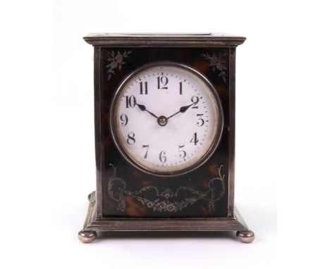 A silver mounted tortoiseshell cased mantel timepiece, William Comyns, London 1912, rectangular, with circular enamel dial an