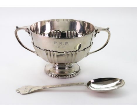 An Edwardian silver two handled bowl, Goldsmiths & Silversmiths Company, London 1903, with bats wing lobed and fluted sides, 
