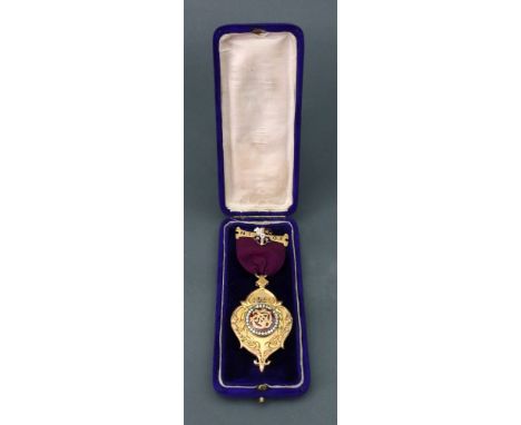 A 9ct gold and enamel Masonic Lodge jewel, 1921, N.I.O.F., the red guilloche enamel centre within a white paste frame, inscri